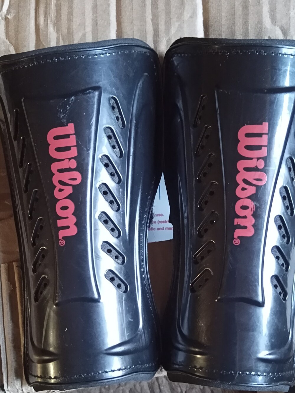 #FREE WITH BUNDLE.Wilson Black Shin Guards with Pink Logo